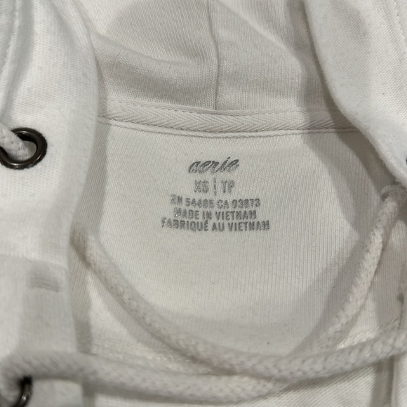 White oversized hooded sweatshirt with metal brad and rope ties. - Picture 3 of 3